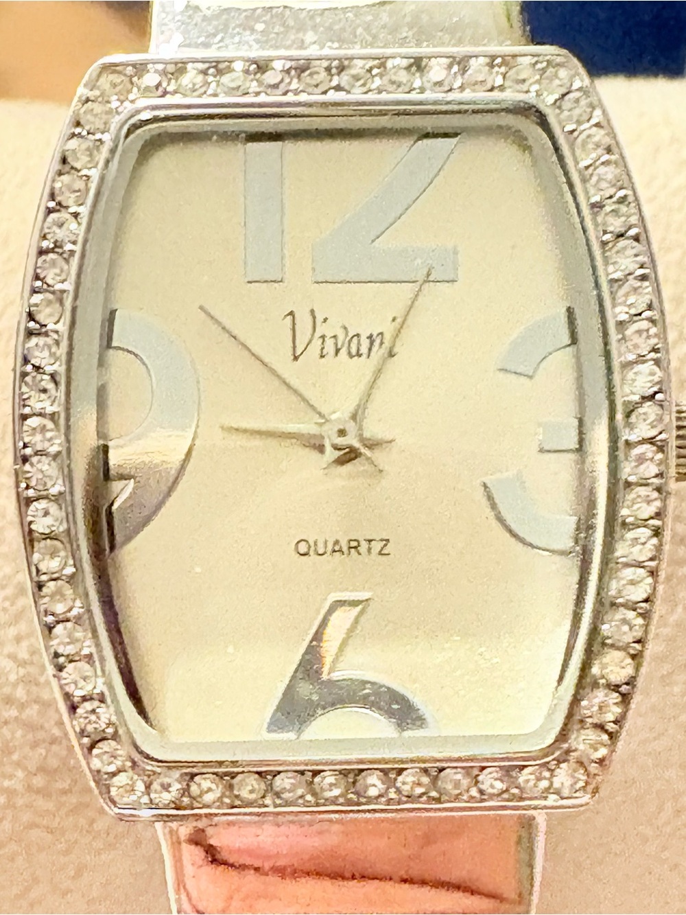 Vivani silvertone bangle style wristwatch rectangular bezel With
Rhinestones